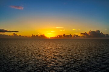 Scenic orange sunset over the calm sea