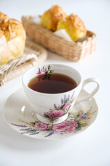 Obraz na płótnie Canvas a cup of tea and bread
