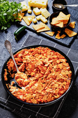 nacho chicken cheese casserole in baking dish