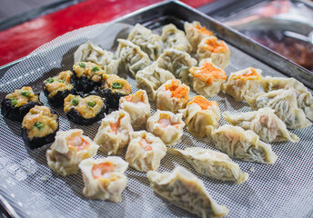 Assorted dim sum appetizers ready to sale. Set of Chinese food for share. Asian buffet. Traditional...
