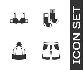 Set Short or pants, Bra, Winter hat and Socks icon. Vector