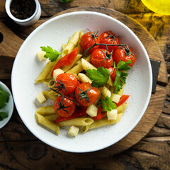 Pasta with baked tomatoes and cheese