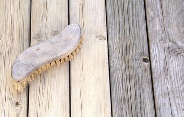 Cleaning the veranda with brush. Difference betwen washed and not washed.
