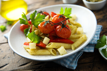 Pasta with baked tomatoes and cheese