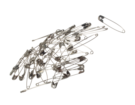 Safety Pin brooch pour fall down, explosion in air. Many safety pin big size splash fly in group floating. White background isolated high speed shutter freeze motion