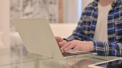 Close Up of Man Typing on Laptop 