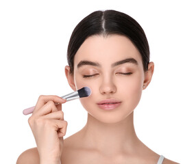 Fototapeta premium Teenage girl with makeup brush on white background