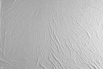 Crumpled white fabric as background, top view