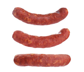 Collage with fresh raw sausages on white background