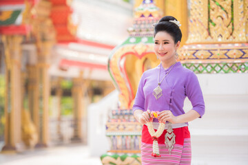 Beautiful girl in White Thai dress