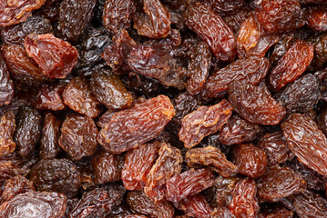 Sweet dried raisins background. Top view of dried fruit .