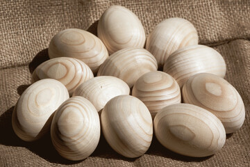 Top view of easter eggs lying on burlap