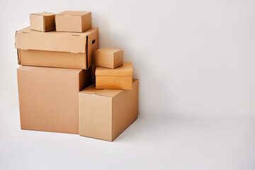 Heap of cardboard boxes on white backround