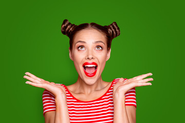 So excited and positive girl isolated on red background loud laughs raising her head and hands up. Concept of advertising, sale and discount isolated on red background