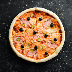 Pizza with bacon, cucumber and olives. Food delivery. Free space for text.