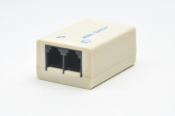 Splitter for connecting the phone and ADSL router to the Internet on a white background