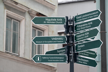 Navigation boards in Tallinn's Old Town provide direction info on St. Nicholas Church, Museum of Occupation, Toompea, Tourist Information Center, Port, Catherine's Guild, Railway Station and more