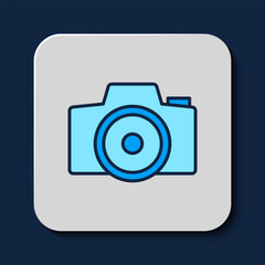 Filled outline Photo camera icon isolated on blue background. Foto camera. Digital photography. Vector
