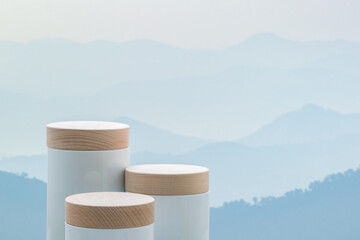 Surreal podium outdoors on sky blue pastel soft cloud with misty mountain nature landscape background.Beauty cosmetic product placement pedestal present minimal display,summer paradise dreamy concept.