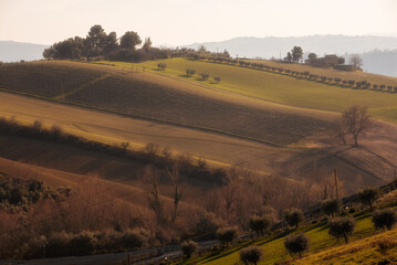 Countryside landscape in autumn, agricultural fields among hills