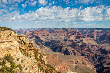Fototapeta na wymiar The South Rim of the Grand Canyon National Park, carved by the Colorado River in Arizona, USA. Amazing natural geological formation. The Mather Point.