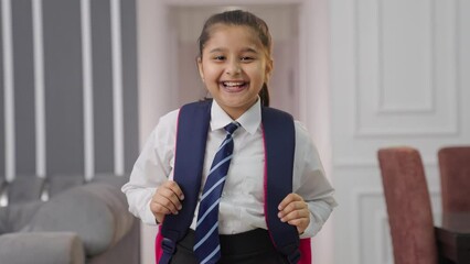 Indian school kid girl dancing and enjoying