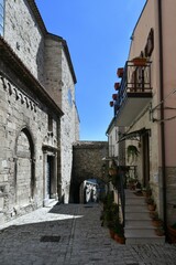 A narrow street among the old houses of Guardialfiera, a historic town in the state of Molise in Italy.