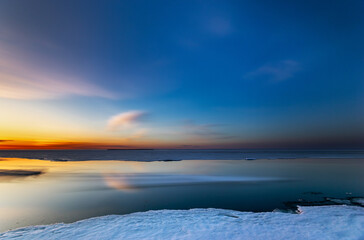 Sunset landscape with the movement of an ice floe on a long exposure