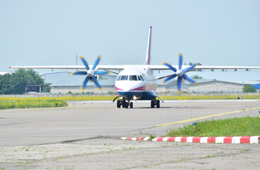 Turboprop passenger aircraft on the runway