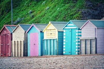 Colourful beach huts in Budleigh Salterton, Devon, UK 