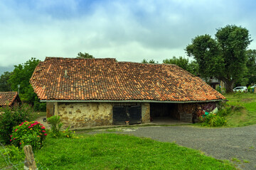 Fototapeta na wymiar Old barn with a tiled roof, Basque Country, Spain.