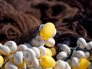 Fishing Nets with Ropes and Floats / Fishing nets with ropes and floats in the harbor. La Spezia, Liguria, Italy. In the background