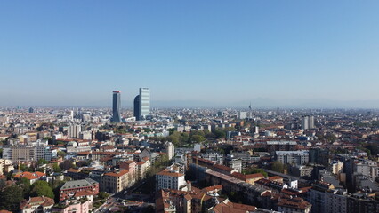 Fototapeta na wymiar A sunny day photo of Milan seen from 110 metres