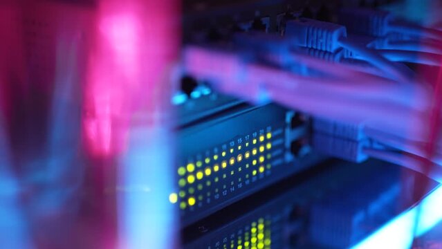 Super computer server racks in datacenter. Concept of big data storage and mining cryptocurrency. Network routers of ISP. Many wires connect to the network interfaces of powerful internet servers