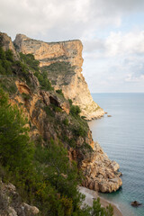 Cliff at Moraig Cove Beach; Alicante; Spain - 591197785