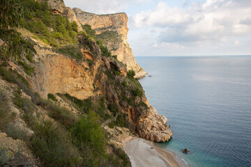 Cliff at Moraig Cove Beach; Alicante; Spain - 591197793