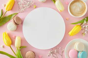Fototapeta na wymiar Mother's Day celebration idea. Top view photo of white circle cup of coffee plate with macaroons hearts baubles yellow tulips and gypsophila flowers on pastel pink background