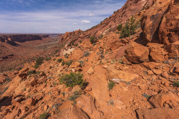 hiking the syncline loop trail in island in the sky district of canyonlands national park, utah, usa