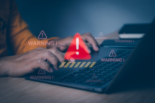 Users display warnings for accessing malicious cyber attack virus software or threats to hack online networks. Technological security with computer, concept warning or notification technology scam
