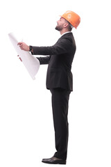 businessman in helmet looking at new drawings . isolated on white