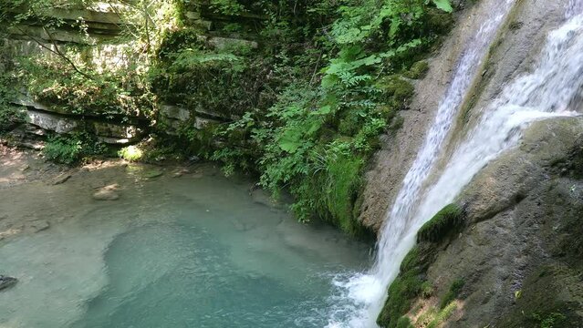 Sinop Erfelek Waterfalls flow into a small pond in real-time