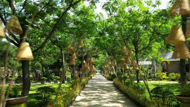 Ancient historical old complex. Culture A national architectural feature. Tropical park trees. visual journey. Park Dao Hoa Lai Nha Trang, Vietnam. 4K