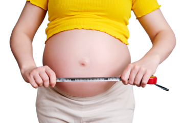 Measuring tape for the waist in the hands of a pregnant woman, isolated on a white background