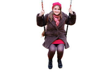 Young woman sitting on swing in autumn park, isolated on a white background - obrazy, fototapety, plakaty