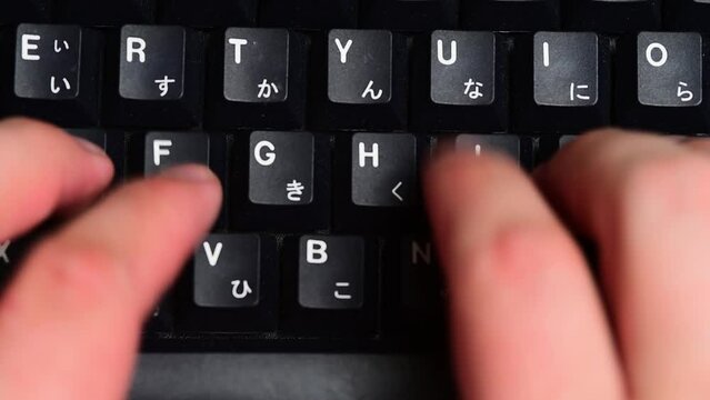 Typing on a mechanical keyboard close up