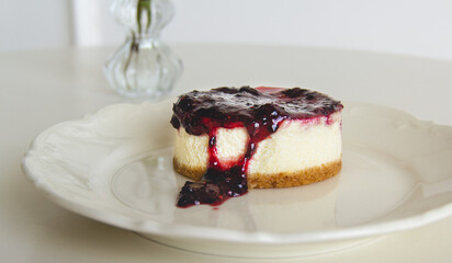 Fresh red barry Cheesecake in a white table