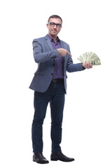 Happy attractive man in glasses holding bunch of money while pointing with finger on you