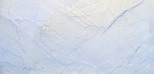 Light blue pearlescent plaster stone wall texture background