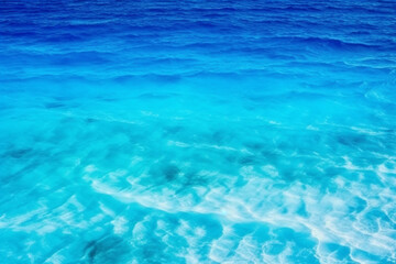 Obraz premium A mesmerizing aerial view of the summer blue ocean. Generative AI
