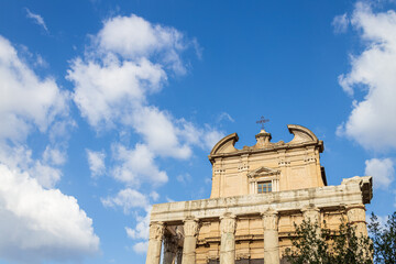 Fototapeta premium Antoninus and Faustina Temple in Roman Forum against sky